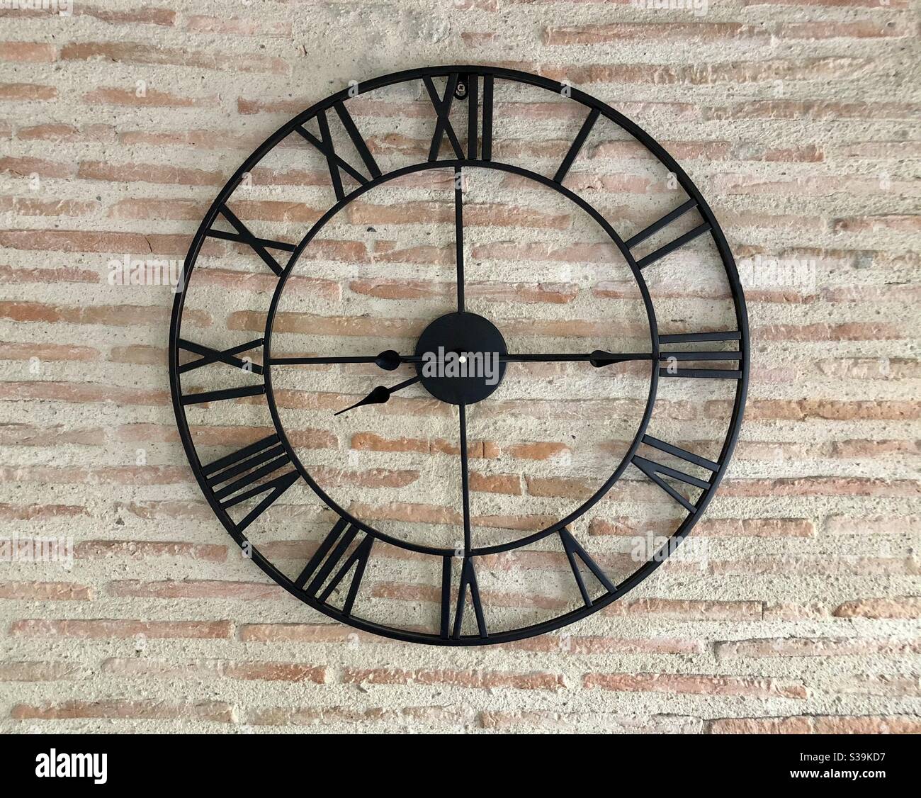 Metal click on brick wall - Smartphone Captured Stock Image