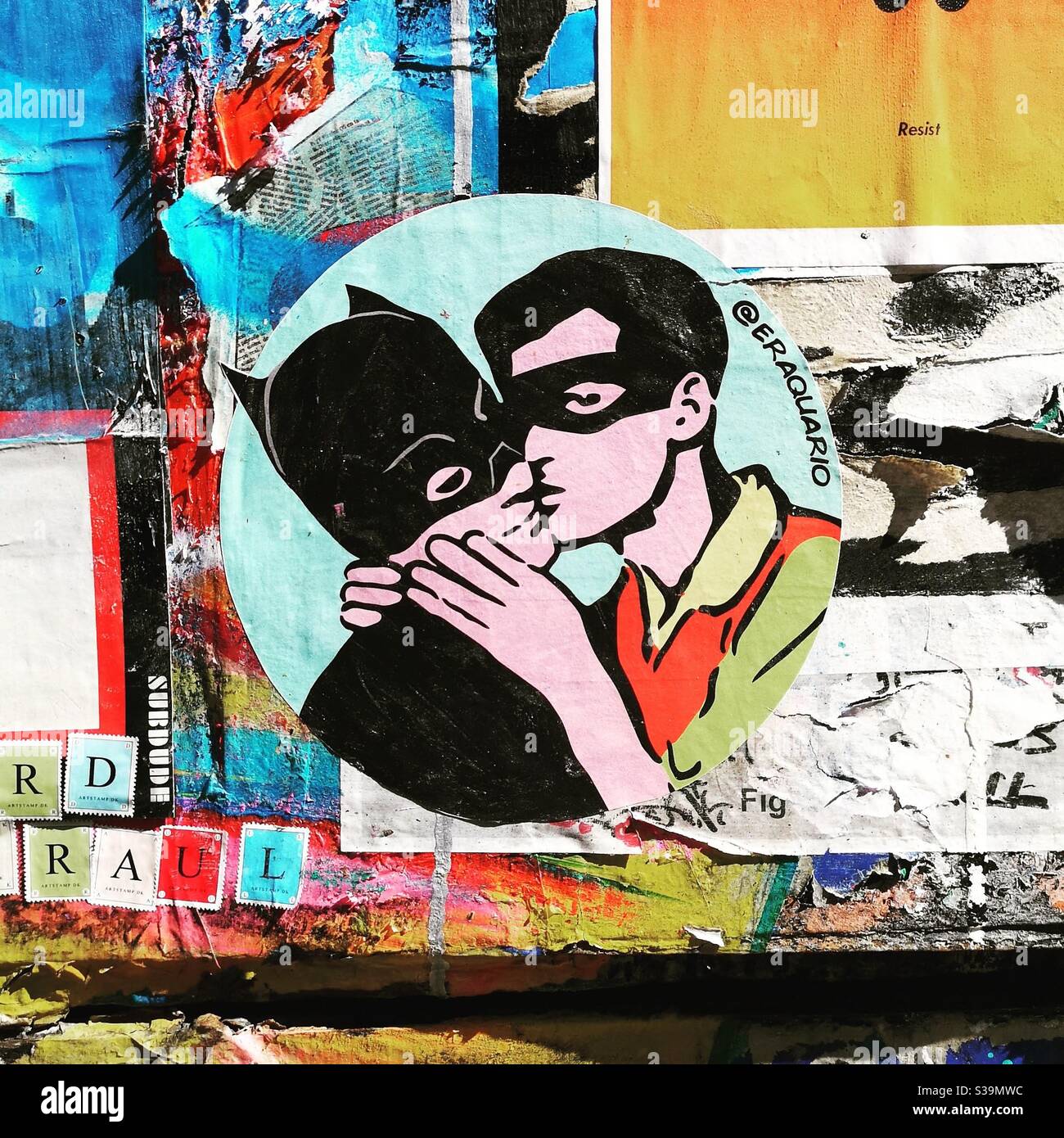 Eraquario street art London gay man kissing Batman and Robin Stock Photo -  Alamy