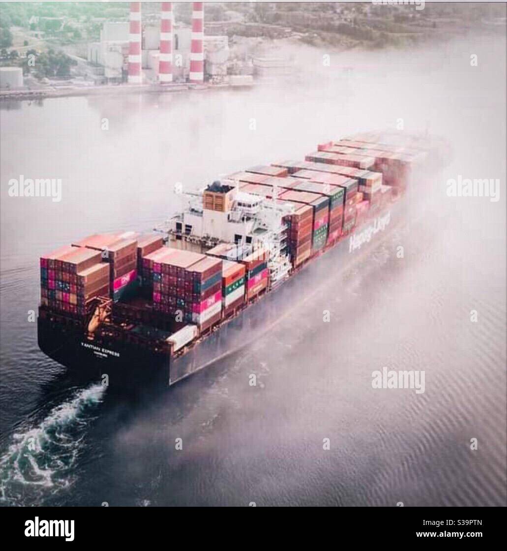 A freighter in heavy fog - Smartphone Captured Stock Image