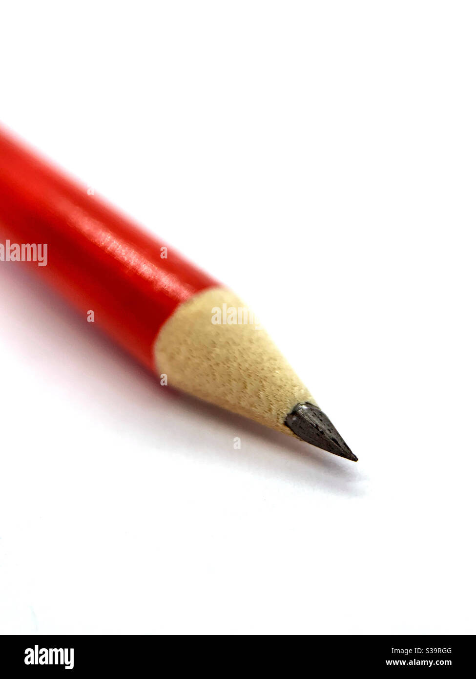 Red pencil.  Sharpened pencil point. Back to school.  Sketch ideas - Smartphone Captured Stock Image