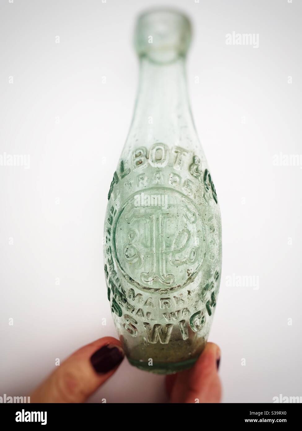 Vintage green glass bottle Stock Photo - Alamy