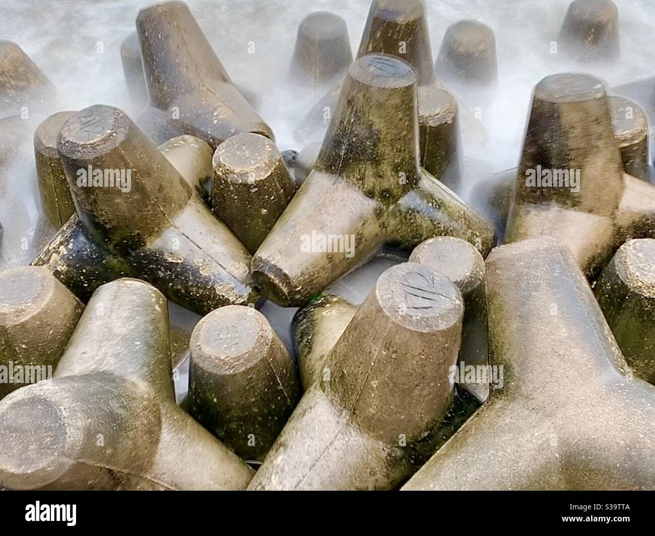 Tetrapods on Ventnor beach, Isle of Wight, to reduce erosion. Stock Photo
