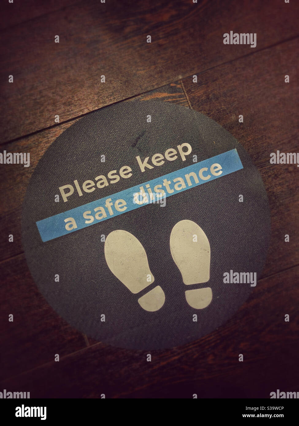 Please keep your distance. Social distancing instructions to prevent the spread of Coronavirus. A reminder of 2020 and the global pandemic. Photo Credit - ©️ COLIN HOSKINS. - Smartphone Captured Stock Image