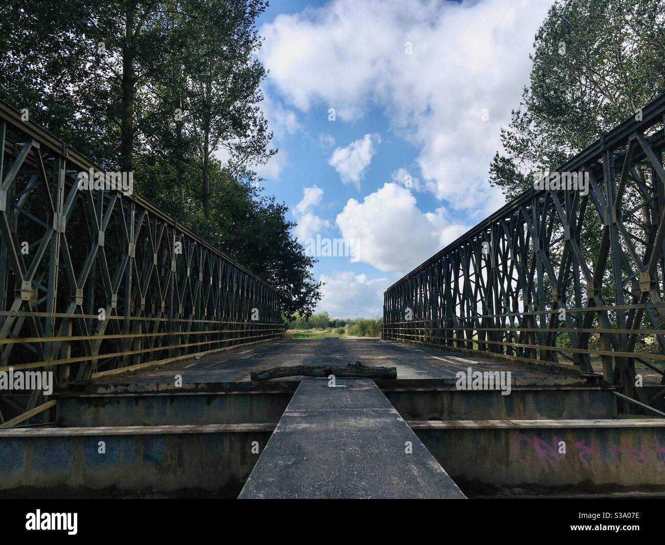 Steel transport bridge being dismantled. - Smartphone Captured Stock Image