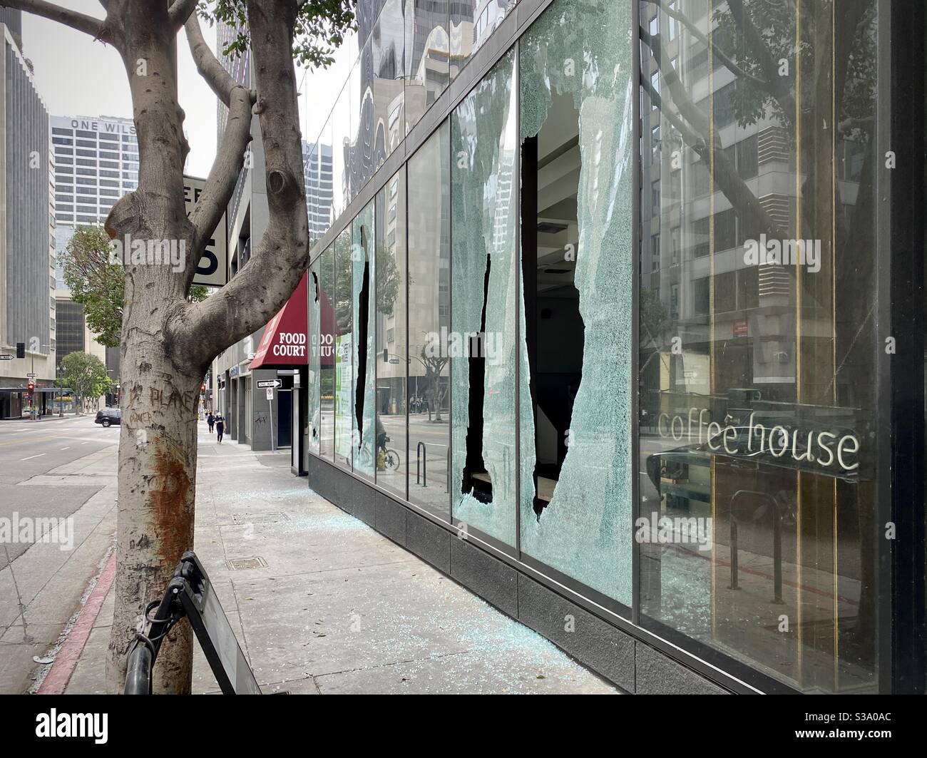 LOS ANGELES, CA, MAY 30, 2020: broken windows at a retail establishment in Downtown, the morning after rioters joined Black Lives Matter protests on the city streets - Smartphone Captured Stock Image