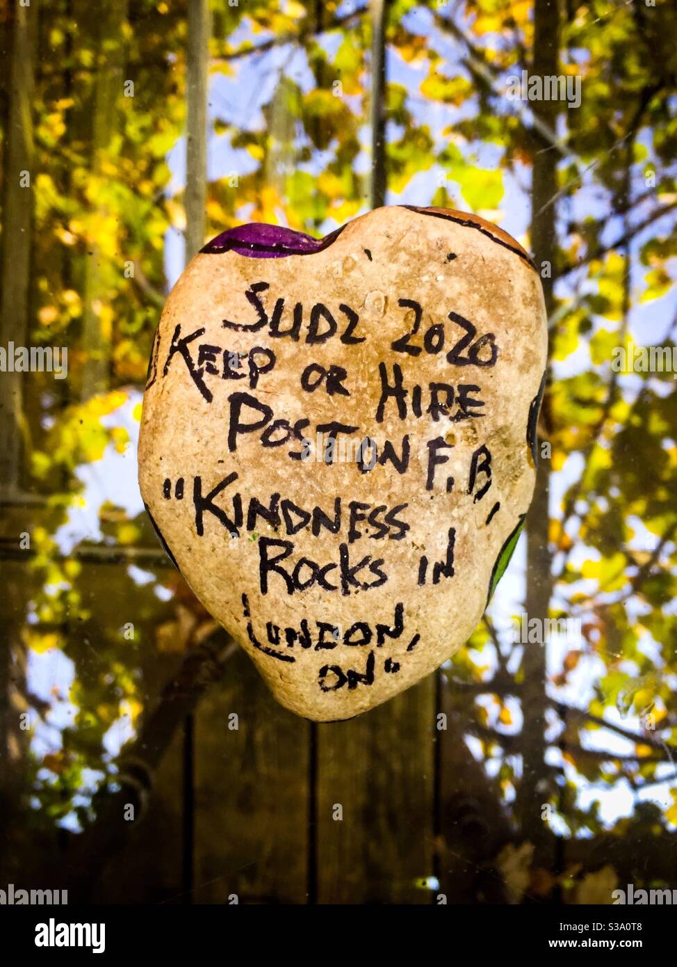 Kindness Rock, a local initiative to promote compassion, kindness, and empathy. No hate. Kindness rocks. Social media connection. F.B. Post. Ontario, Canada. Stock Photo