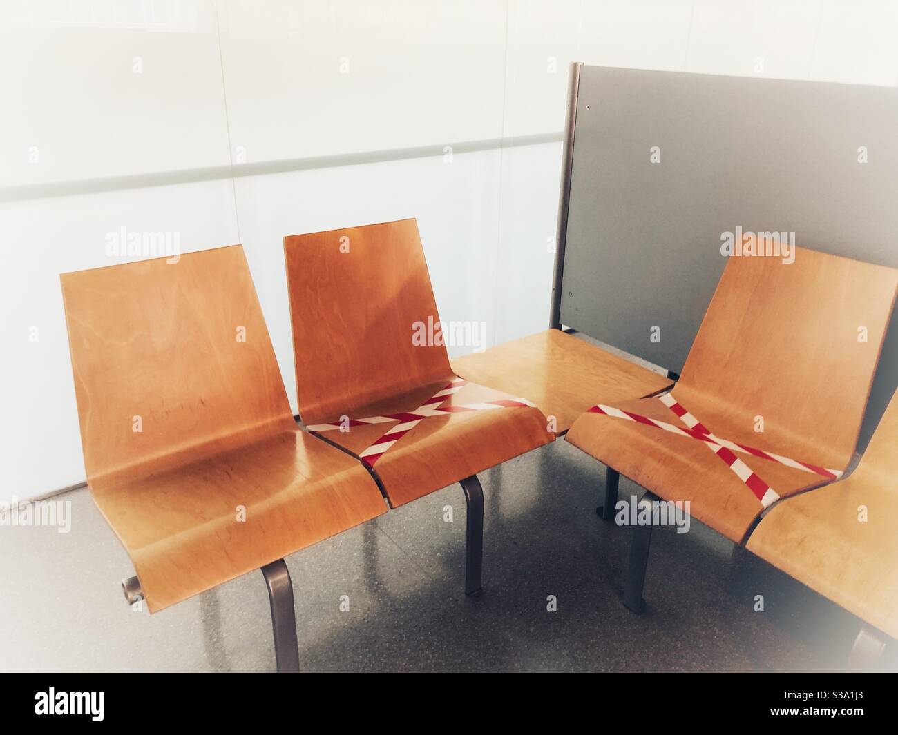 As a result of the COVID-19 pandemic, seats are limited and spaced apart - Smartphone Captured Stock Image