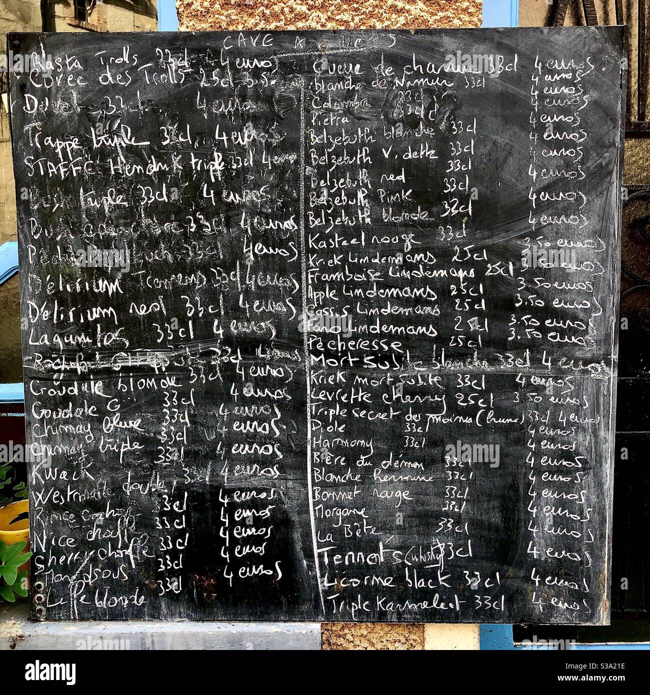 Blackboard with names of more than 50 available beers chalked-up at bar in central France. - Smartphone Captured Stock Image