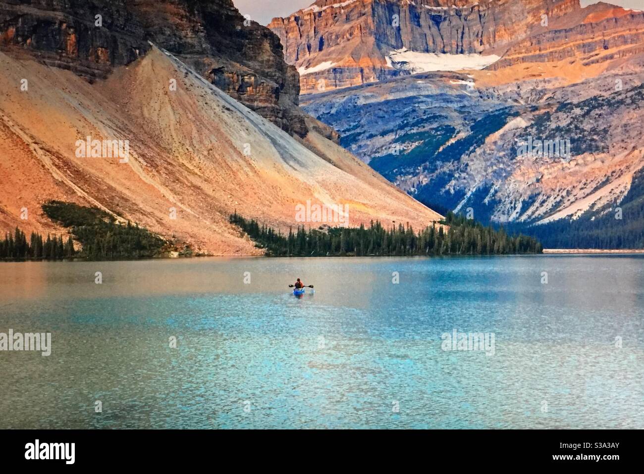 Alberta bound, travelling Alberta, Lomé kayaker, kayaking, Bow Lake, Banff National Park, Canadian Rockies, mountains, lakes, rugged, jagged, peaks, reflections, mirror - Smartphone Captured Stock Image