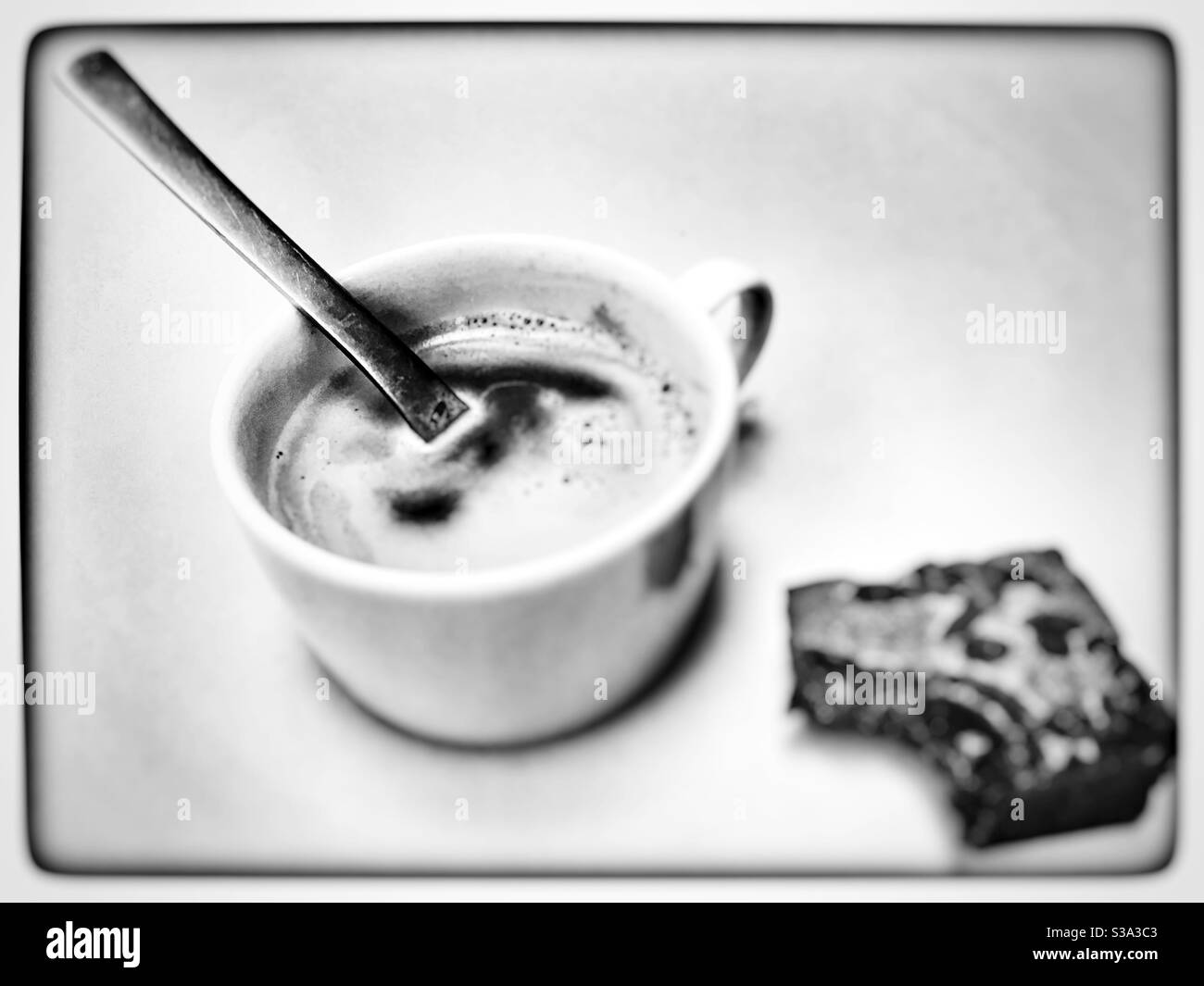 Black coffee with homemade chocolate brownie cake - Smartphone Captured Stock Image