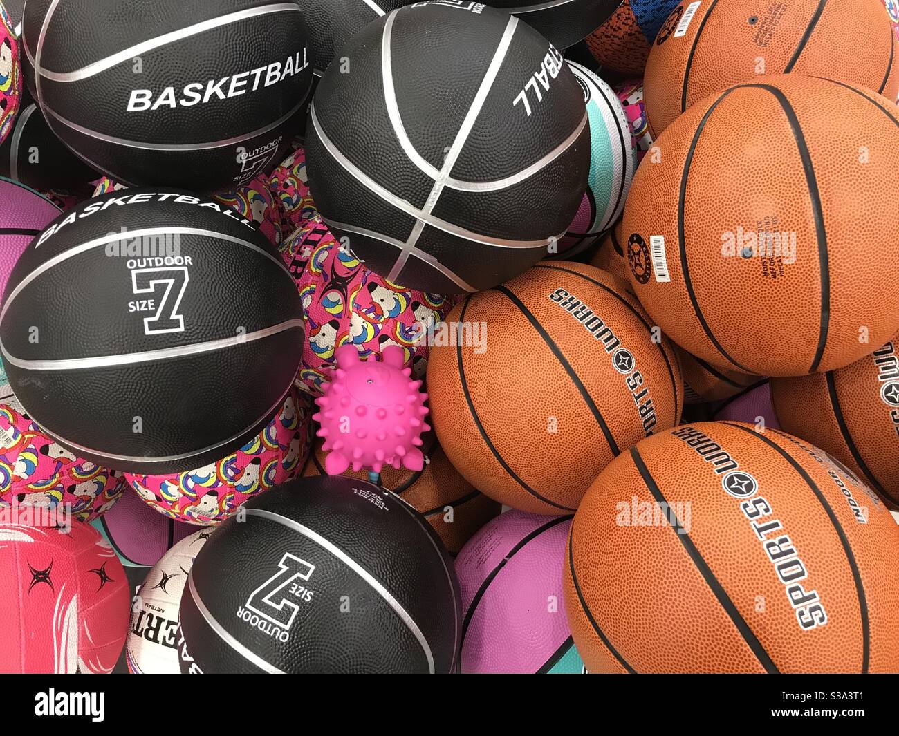 Basketballs and other balls for sale in Kmart store, Chatswood Chase shopping centre, Chatswood, Sydney, NSW, Australia Stock Photo