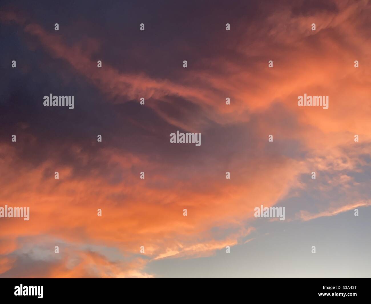 Bright cloudscape with sunset colors - Smartphone Captured Stock Image