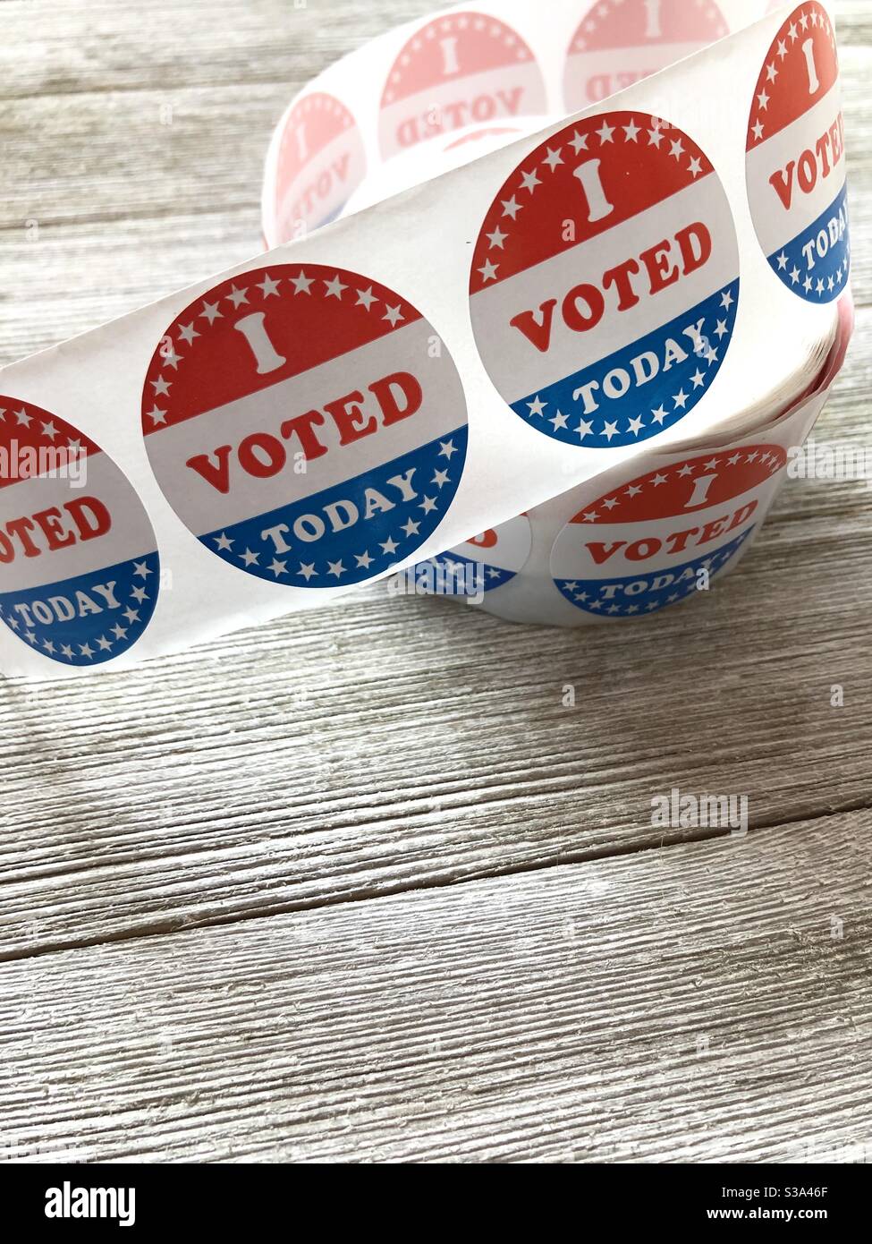 I voted stickers on a wooden table with copy space Stock Photo