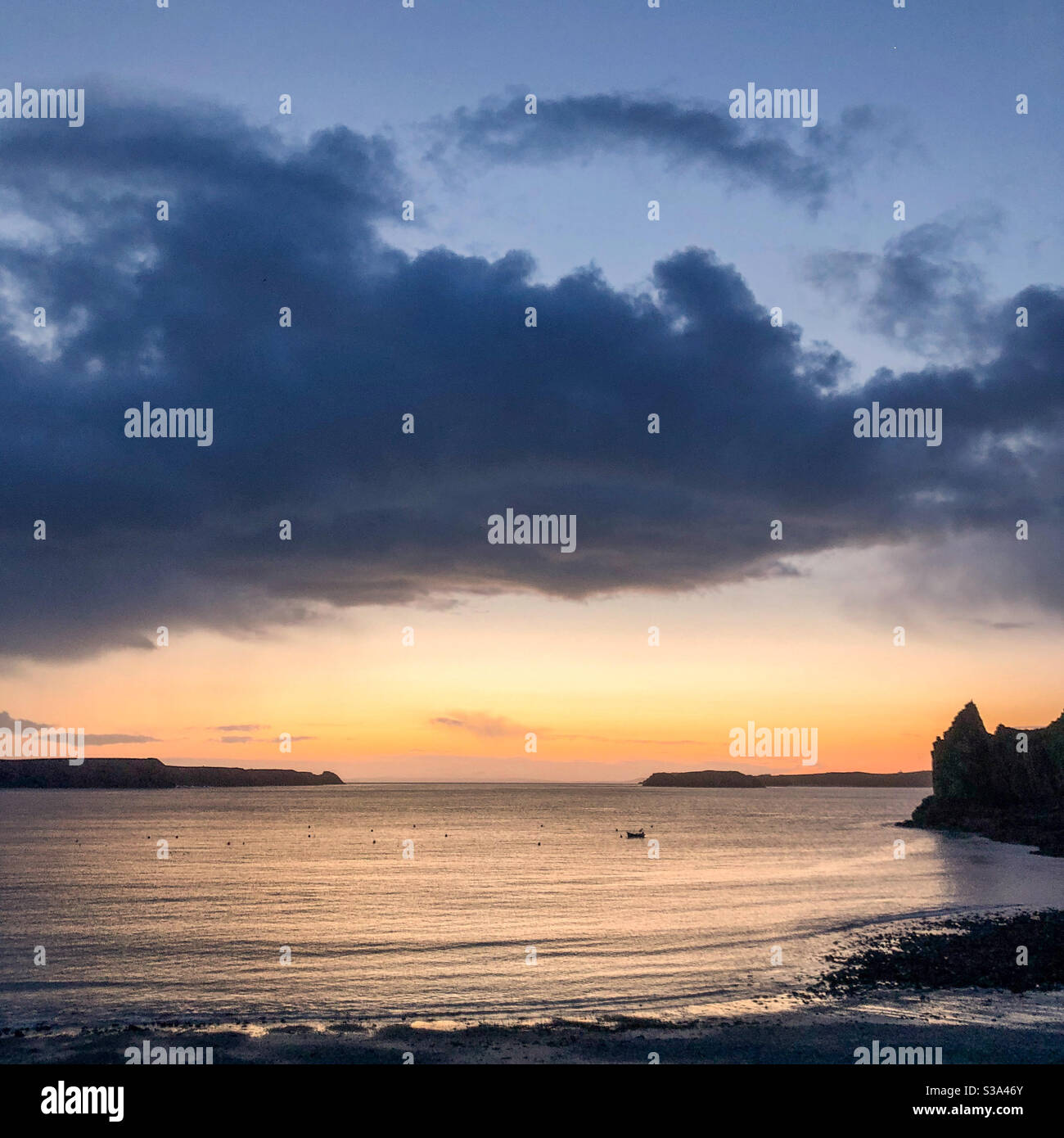 Sunsetting over Lydstep bay. - Smartphone Captured Stock Image