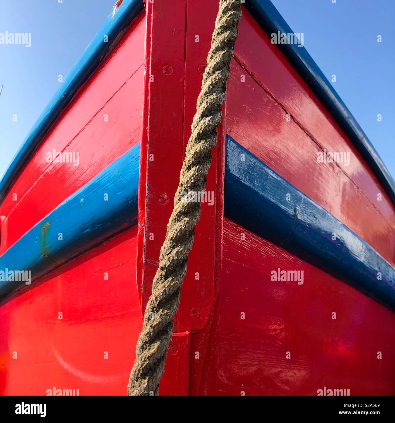 Red boat and rope. Stock Photo