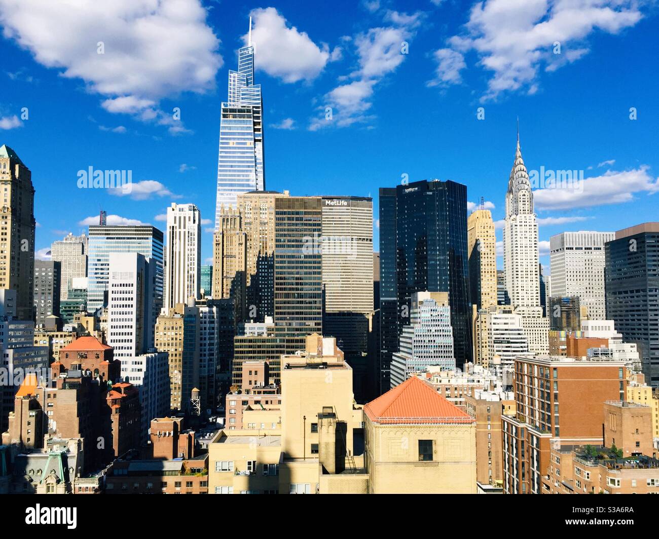 The view of Midtown Manhattan teachings one Vanderbilt has seen from a high-rise roof deck in Murray Hill, NYC, USA - Smartphone Captured Stock Image