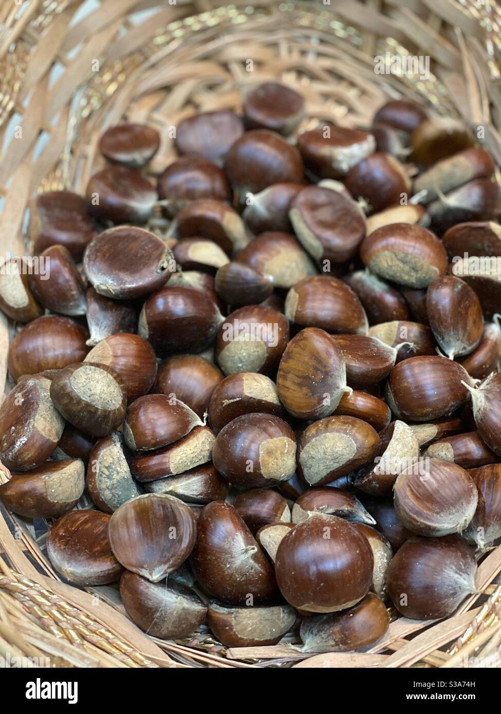 Chestnuts in a wicker container - Smartphone Captured Stock Image