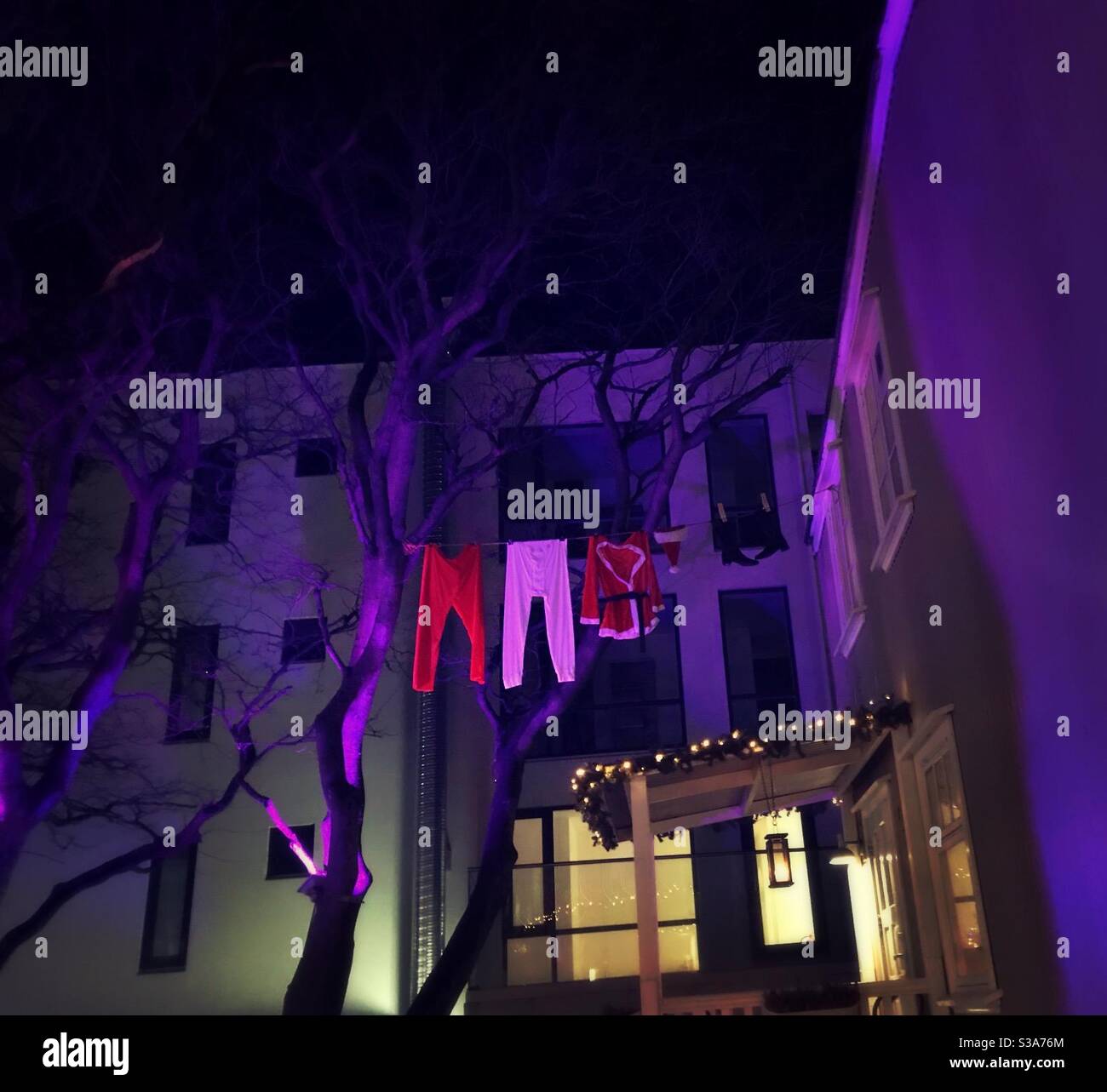 Santa Claus laundry held to dry after a busy Christmas eve - Smartphone Captured Stock Image