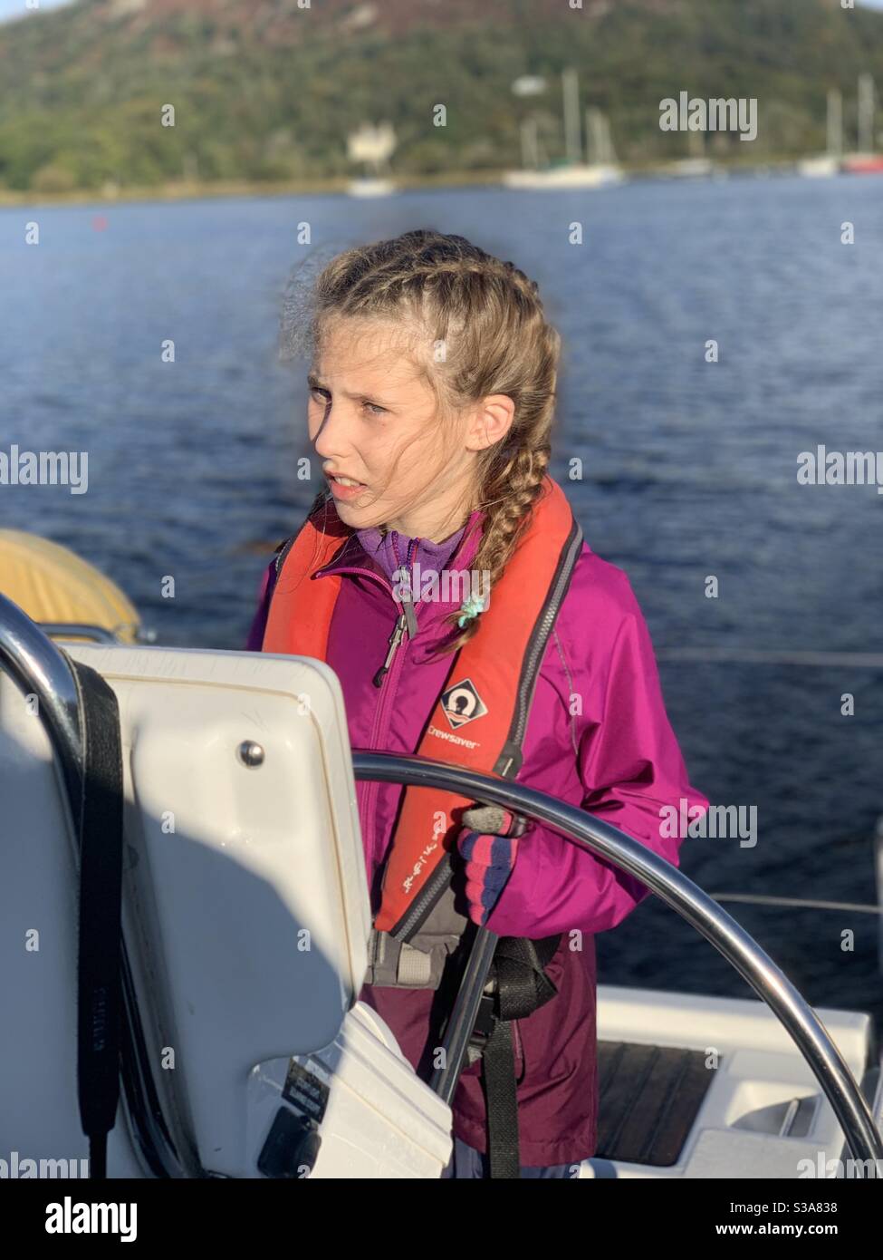 Child life jacket boat hi-res stock photography and images - Alamy