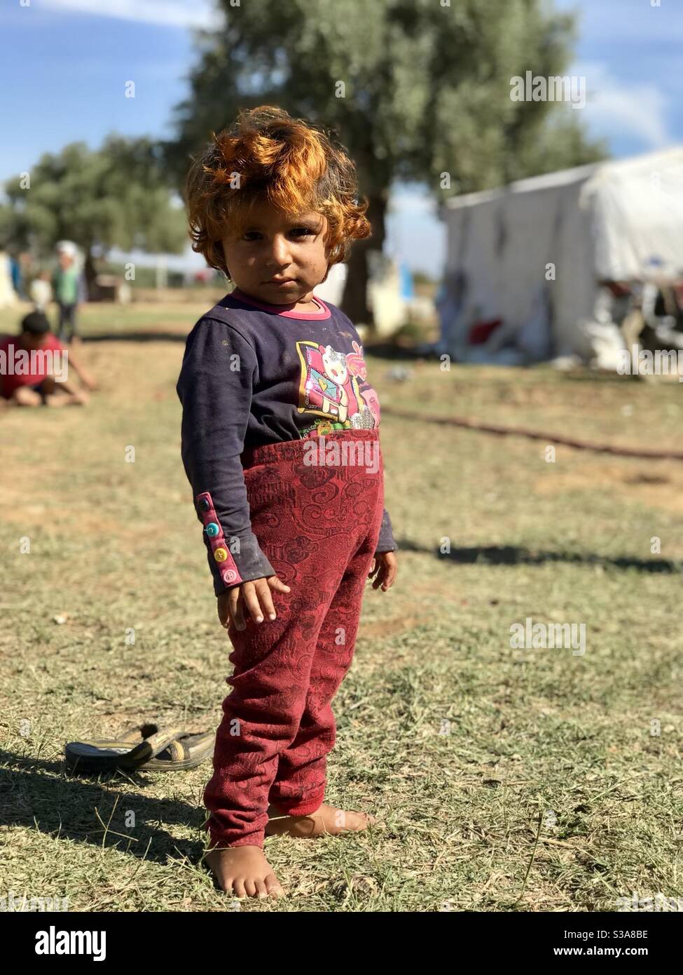 Syrian refugee child living in settlement camp in Turkey Stock Photo