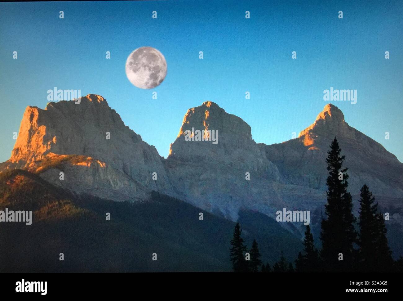 Three Sisters, moon, Bow Valley Provincial Park, Alberta, Canada - Smartphone Captured Stock Image