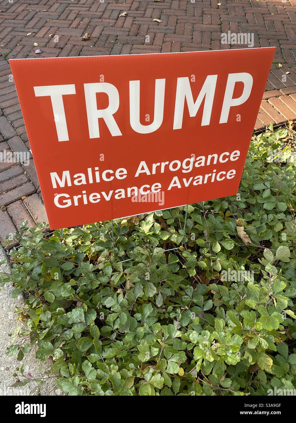 A different definition of MAGA. Anti-Trump sign during the campaign season in suburban Chicago. Stock Photo