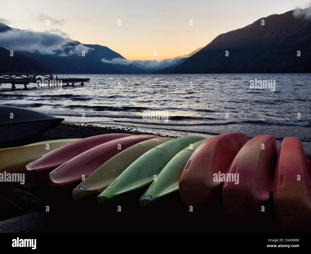Rental kayaks are shored at the Crescent Lake in Olympic National Park - Smartphone Captured Stock Image