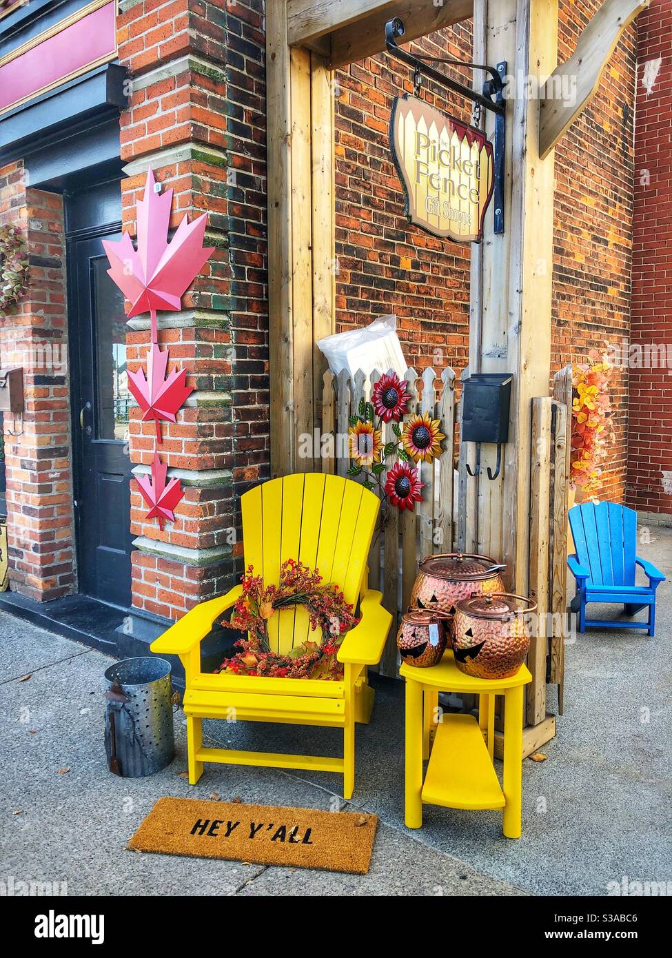 A cozy corner in front of a store in Port Colborne, Ontario, Canada. - Smartphone Captured Stock Image