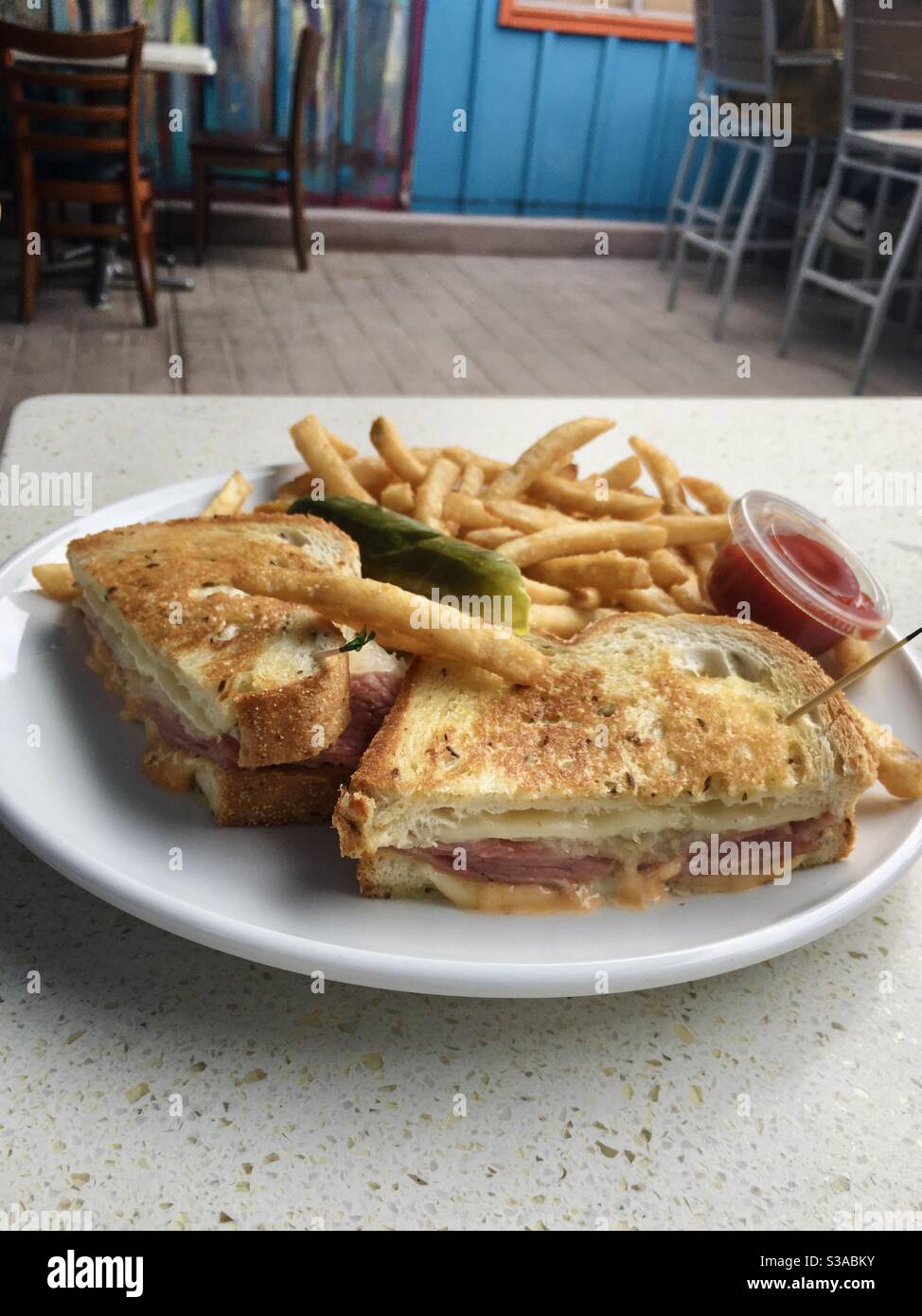 Corned beef reuben sandwich with fries at a restaurant in Carlsbad