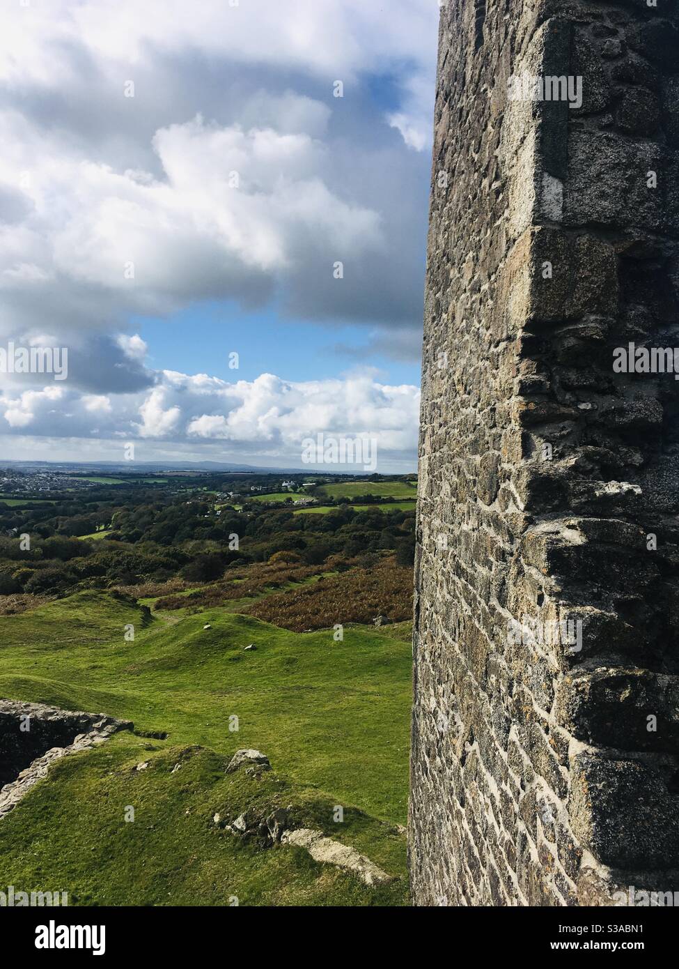 Looking past old wall to far reaching views Stock Photo