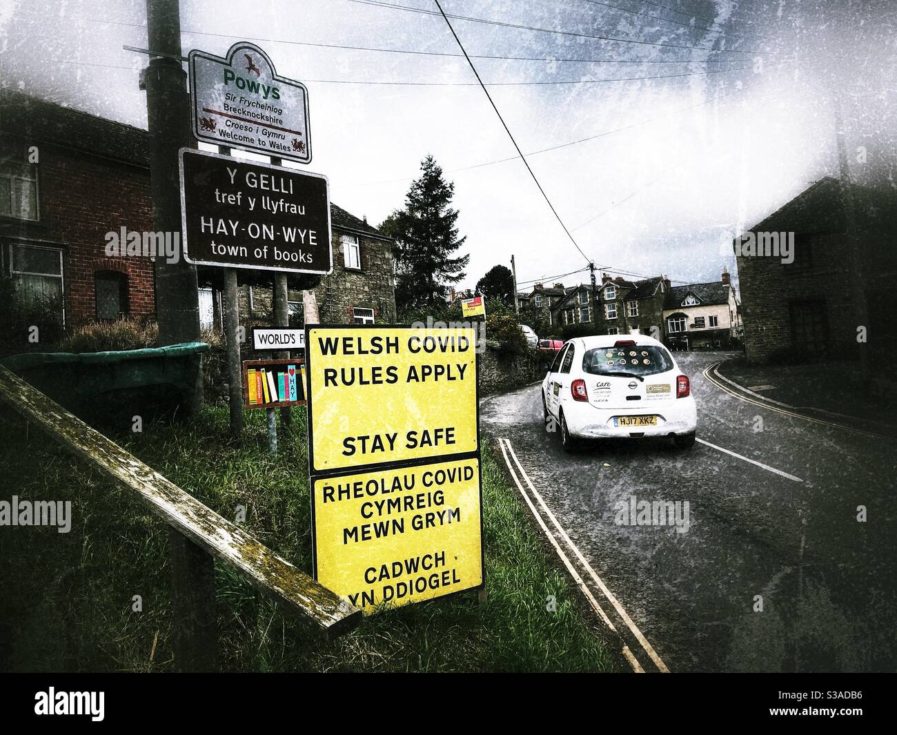 Welsh Covid Rules Apply as a car enters the border town of Hay-on-Wye in Powys Wales in October 2020 - Smartphone Captured Stock Image