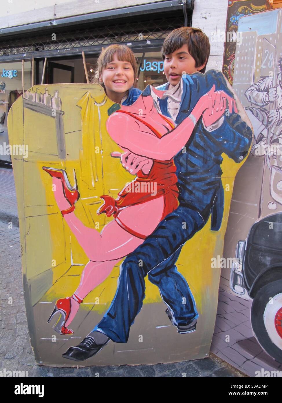 Children posing in tango cut out, Buenos Aires, Argentina. - Smartphone Captured Stock Image