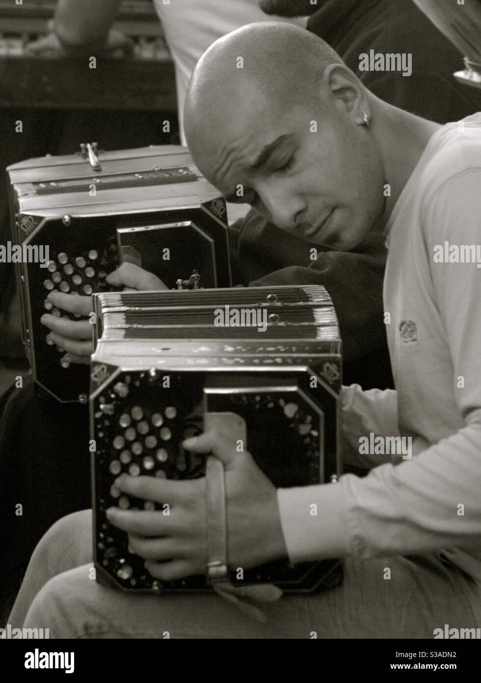 Accordion player at the San Telmo fair, Buenos Aires, Argentina. - Smartphone Captured Stock Image