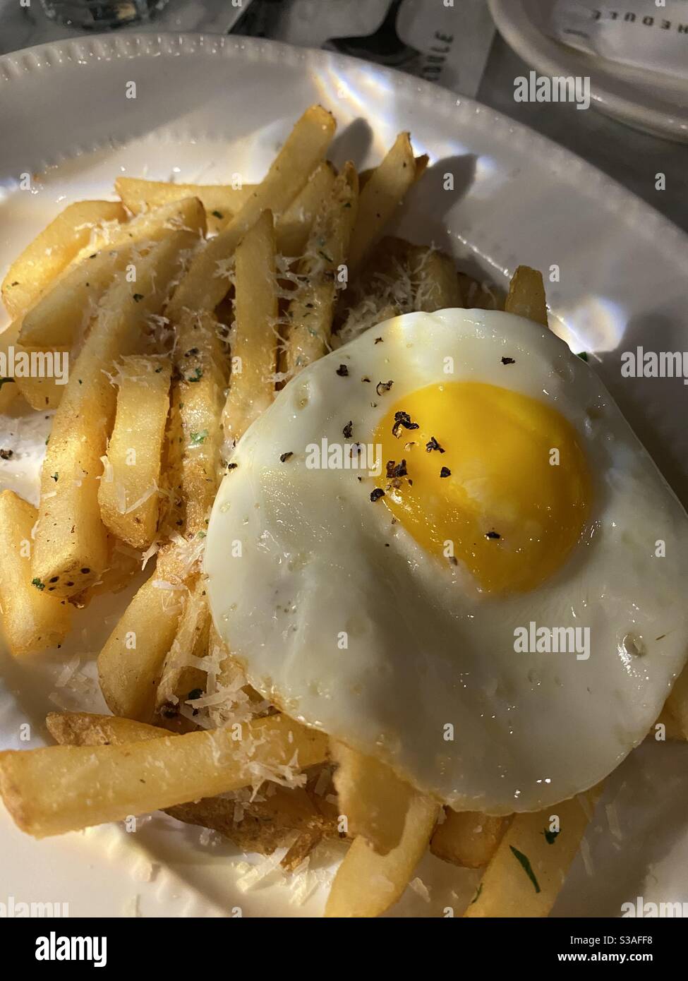 French fries with eggs Stock Photo Alamy