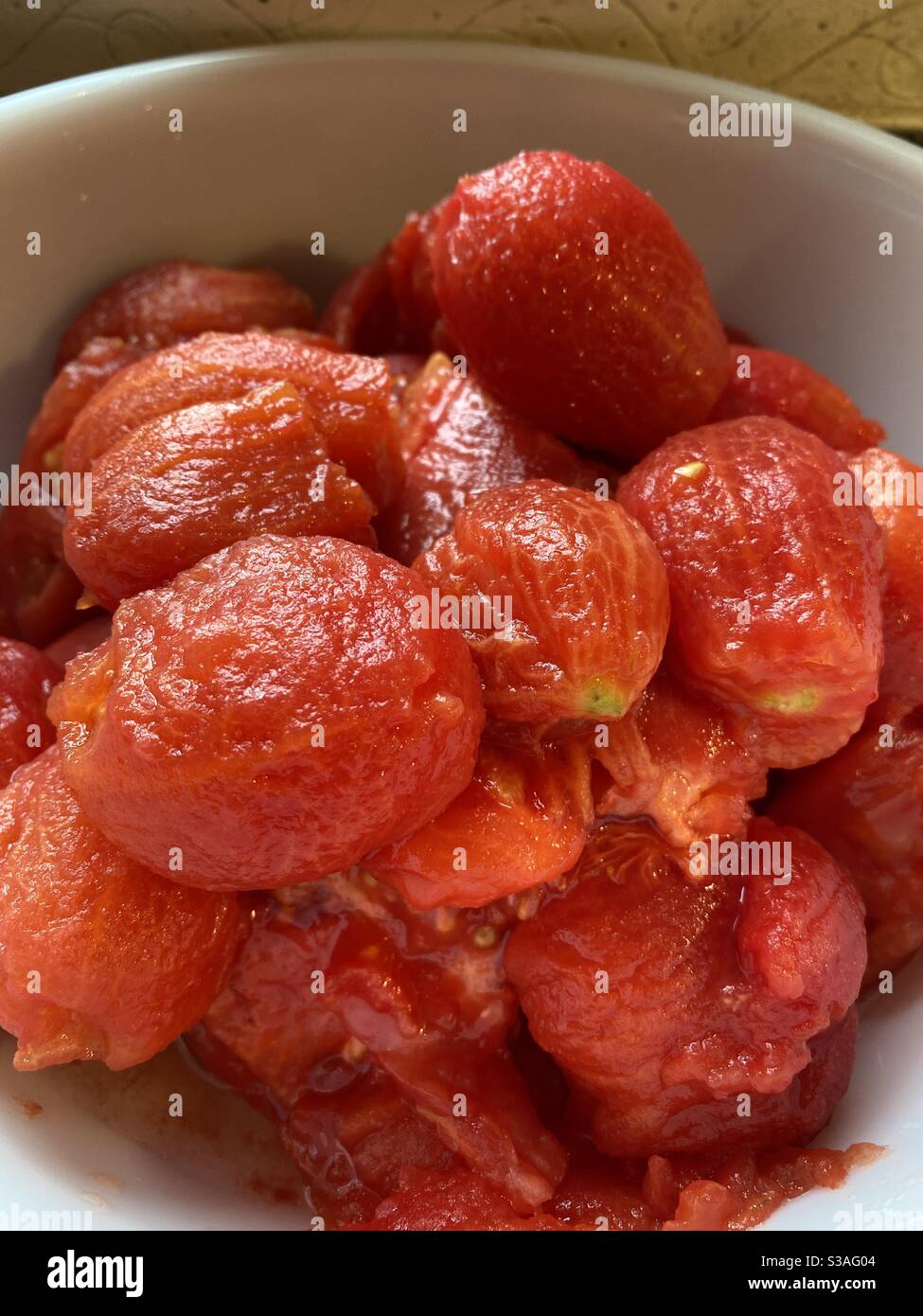 Peeled tomatoes hires stock photography and images Alamy