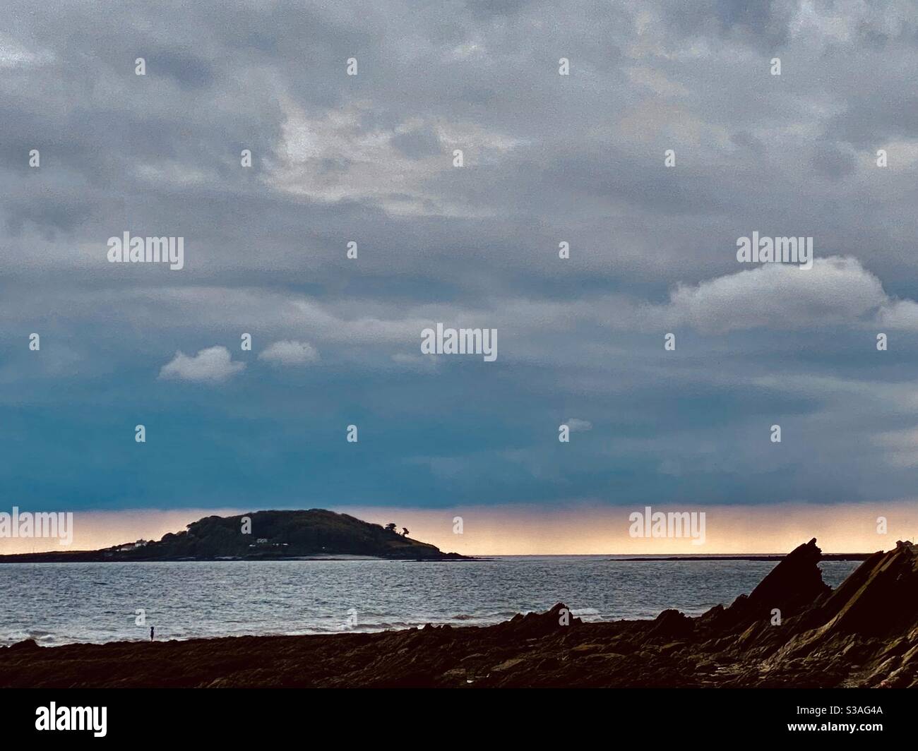 Looe island clouds and sunset - Smartphone Captured Stock Image