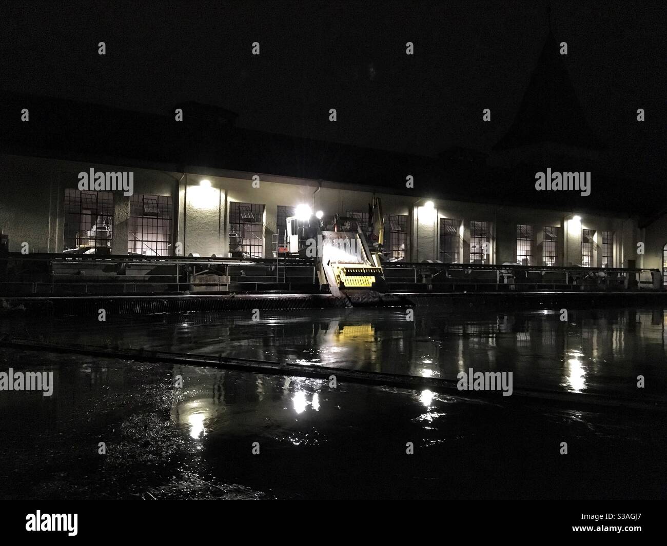 Hydropower electricity station by night - Smartphone Captured Stock Image