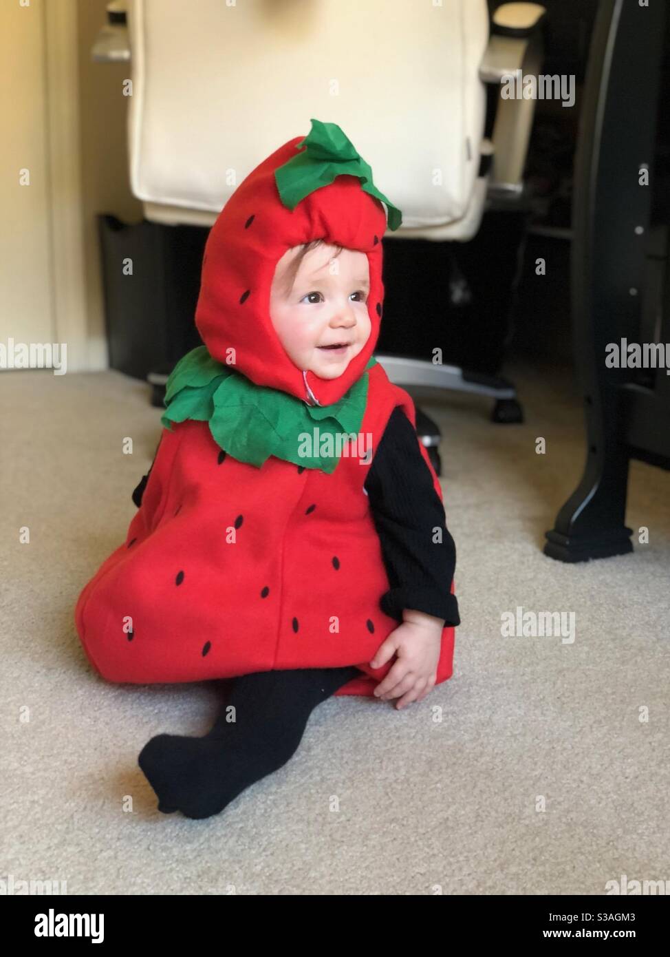 Baby in strawberry costume Stock Photo Alamy