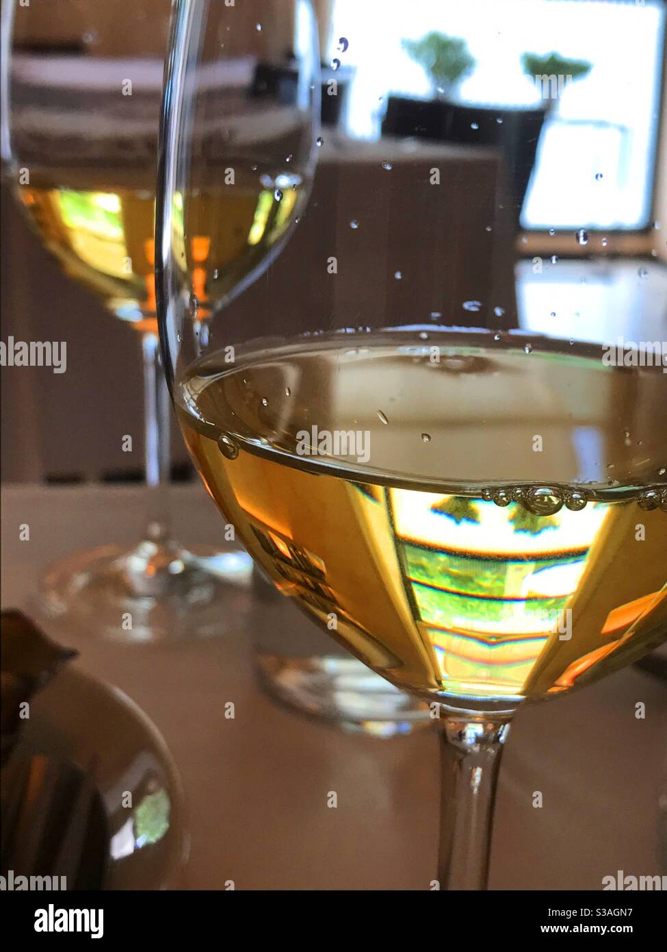 Two glasses of white wine - Smartphone Captured Stock Image