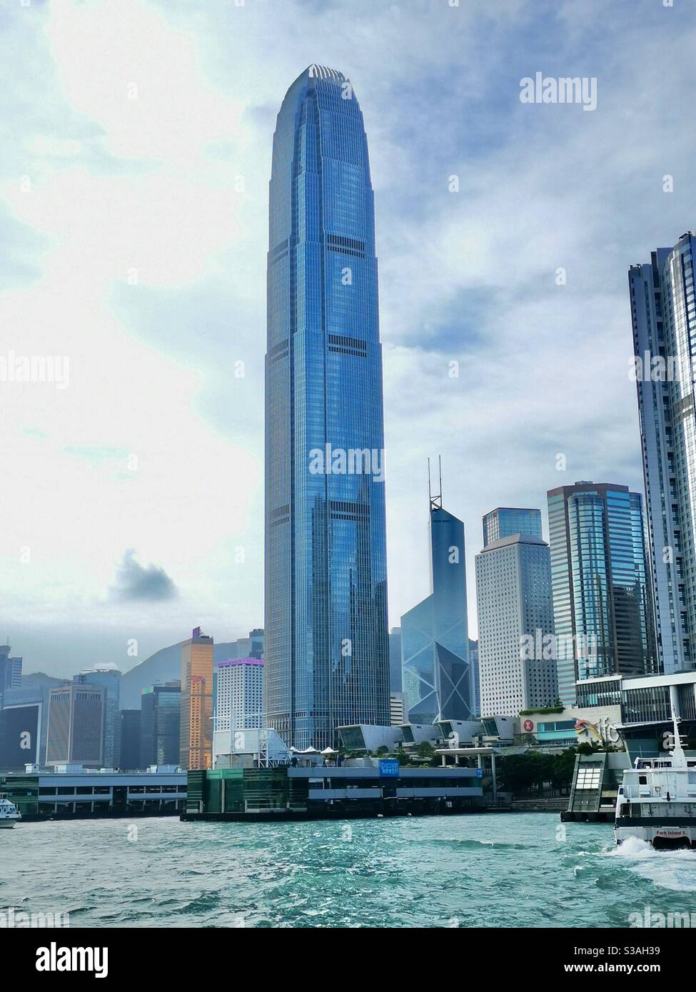 the bank of china building next to the ifc tower in Hong kong. - Smartphone Captured Stock Image