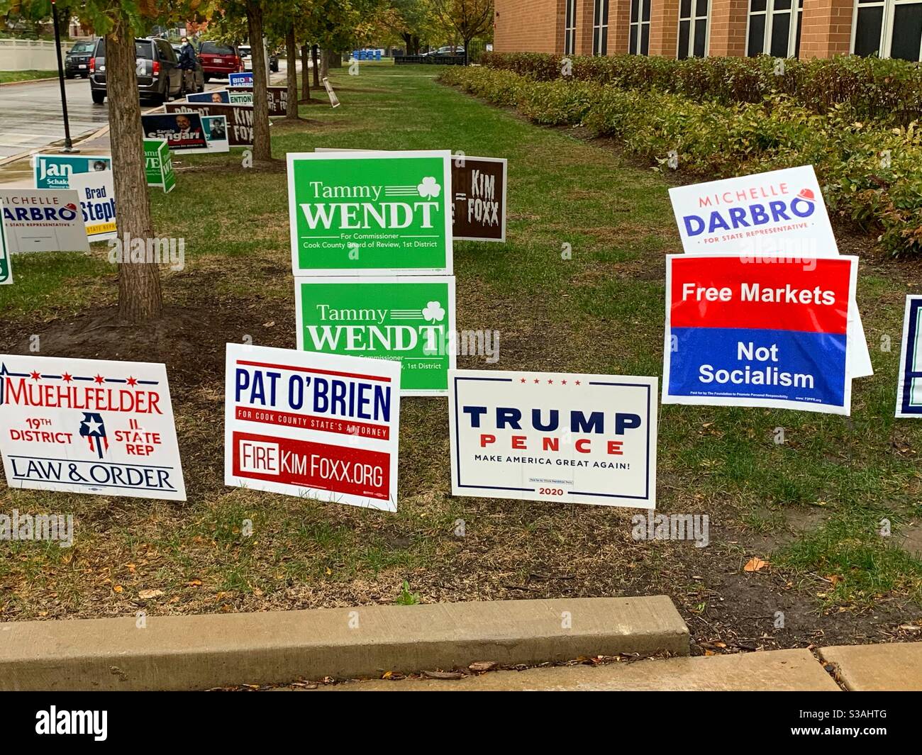 2021 US and Chicago election signs in front of Oriole Park School. Stock Photo