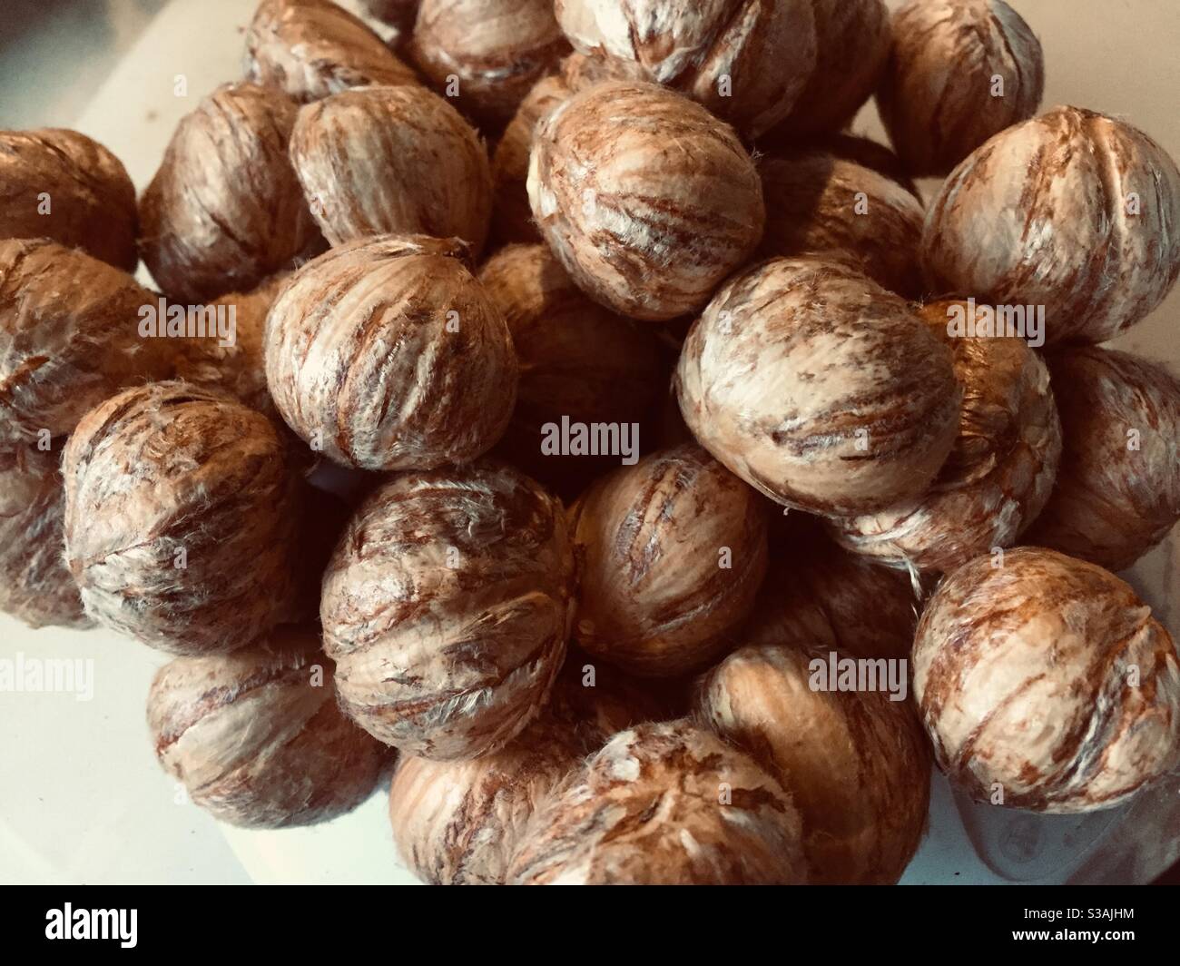 A pile of brown peeled sweet chestnuts - Smartphone Captured Stock Image