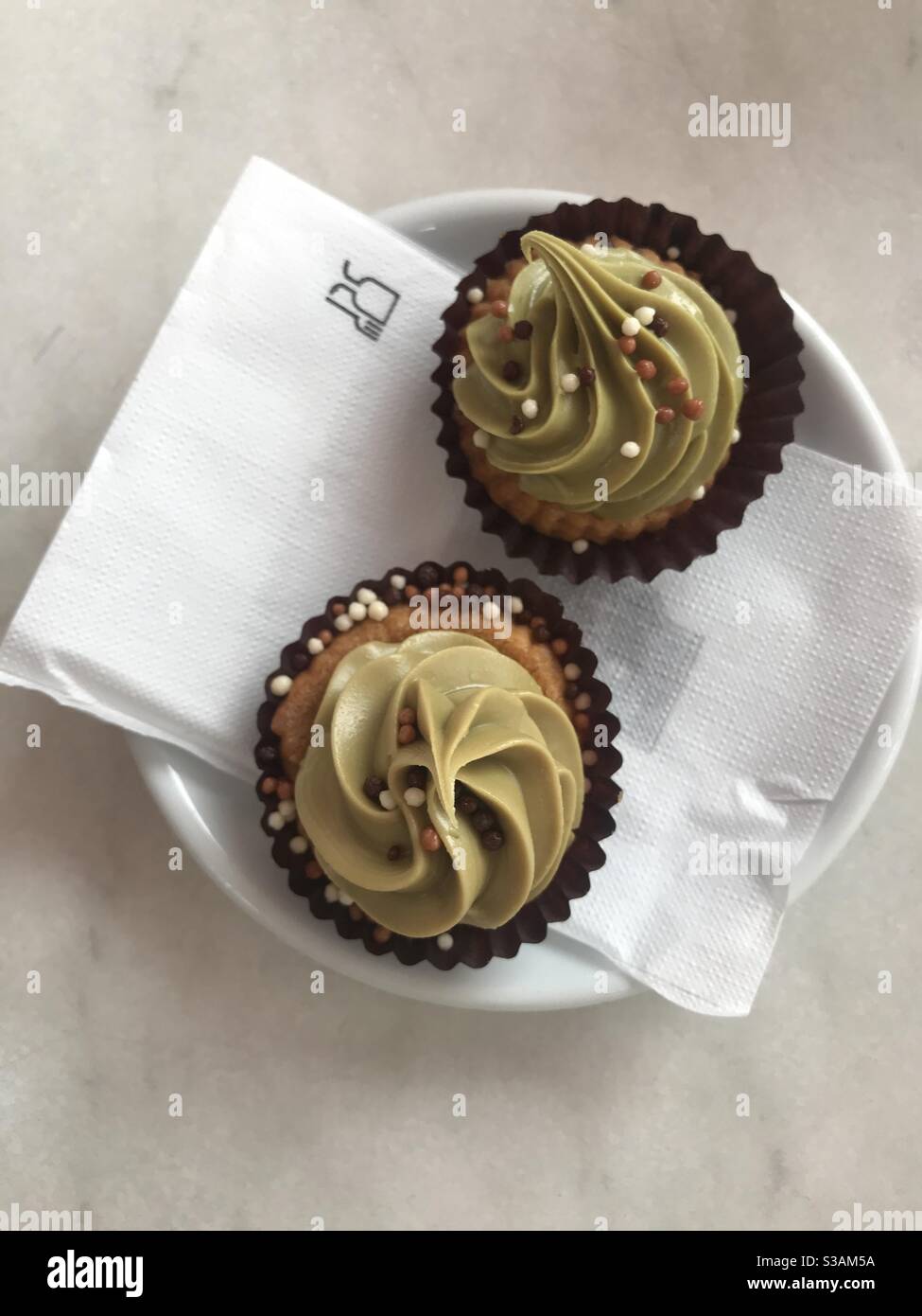 Mini tarts filled with pistachio cream - Smartphone Captured Stock Image