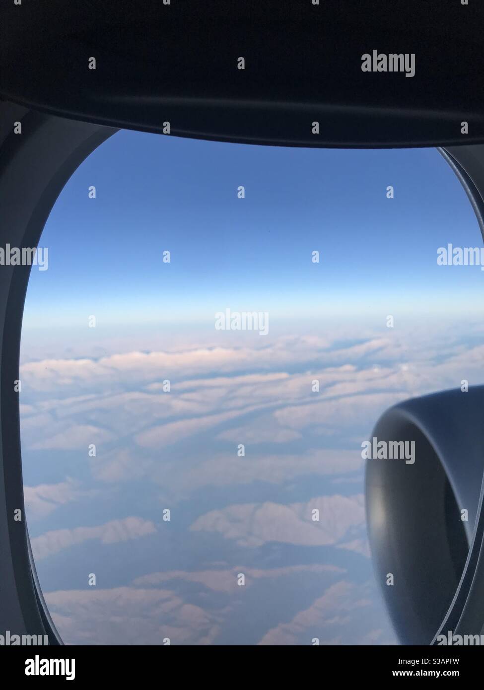 Image taken from an aircraft window mid-flight - Smartphone Captured Stock Image