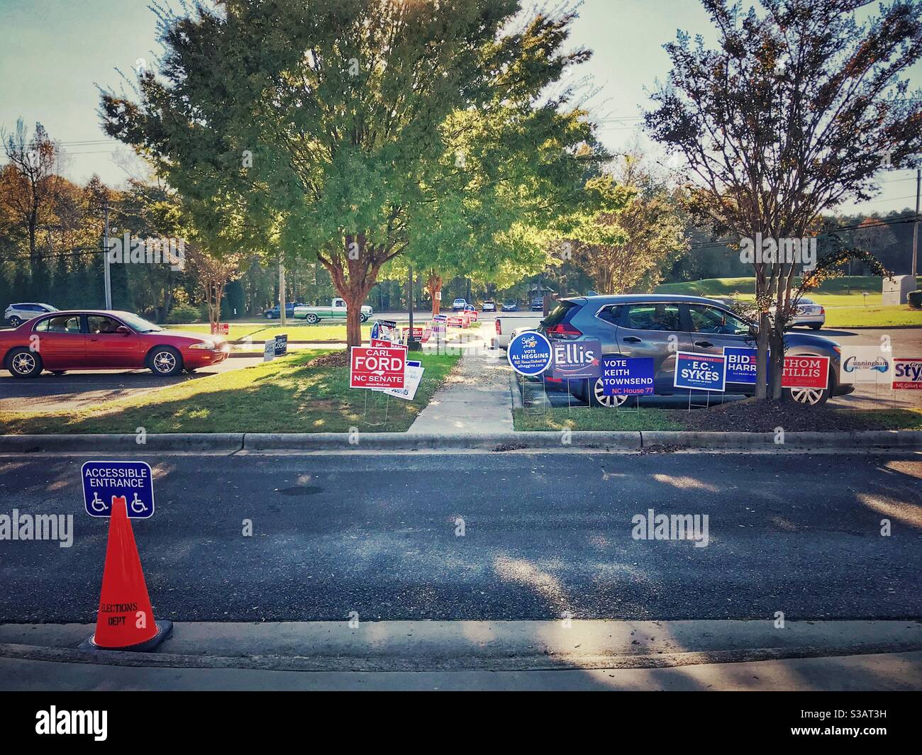 Parking lot with political campaign signs at voting spot - Rowan Public Library, Landis, North Carolina, October 27,2020 - Smartphone Captured Stock Image