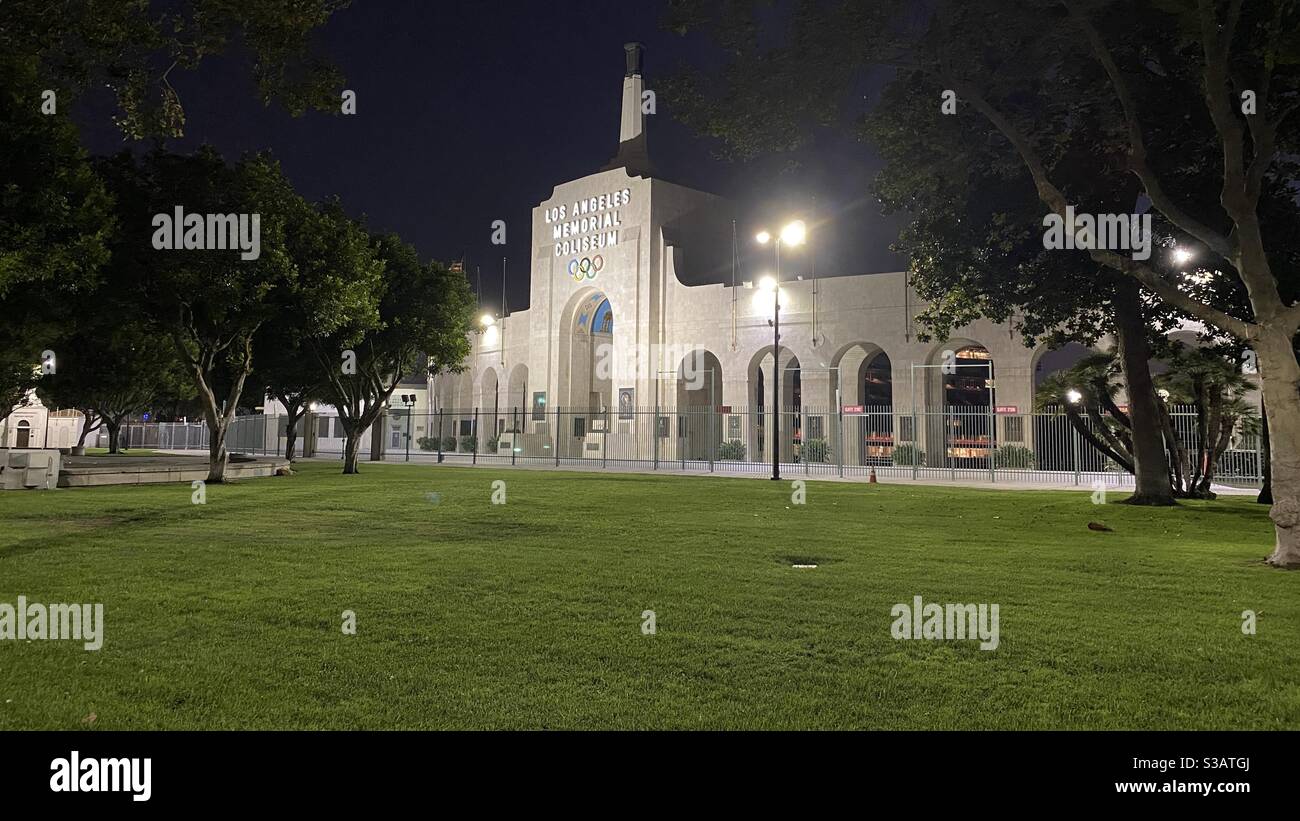 LOS ANGELES, CA, JUL 2020: side view of entrance to Los Angeles Memorial Coliseum, home of the USC Trojans and the Los Angeles Rams, in Exposition Park at night Stock Photo