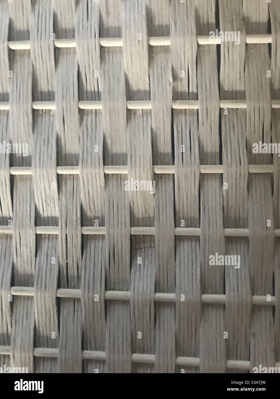 Close up image of a white wicker basket - Smartphone Captured Stock Image