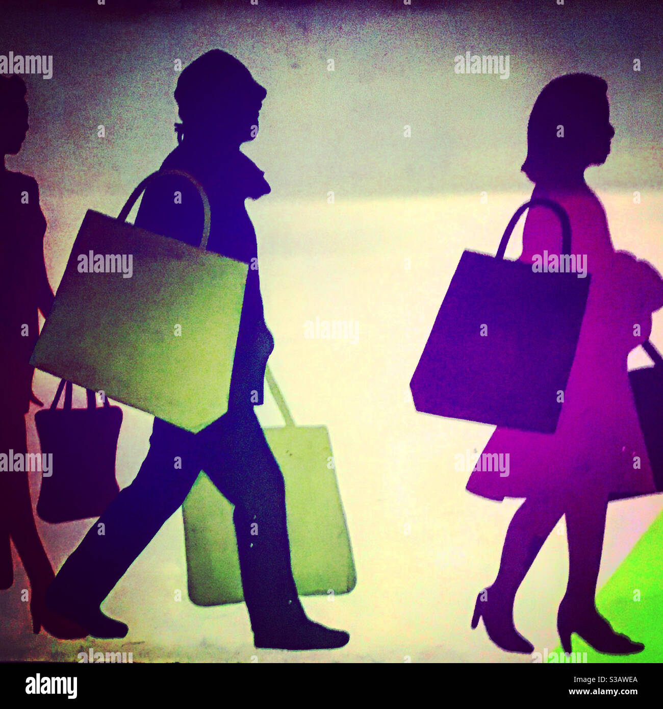 Shopping addict carrying their shopping bags Stock Photo