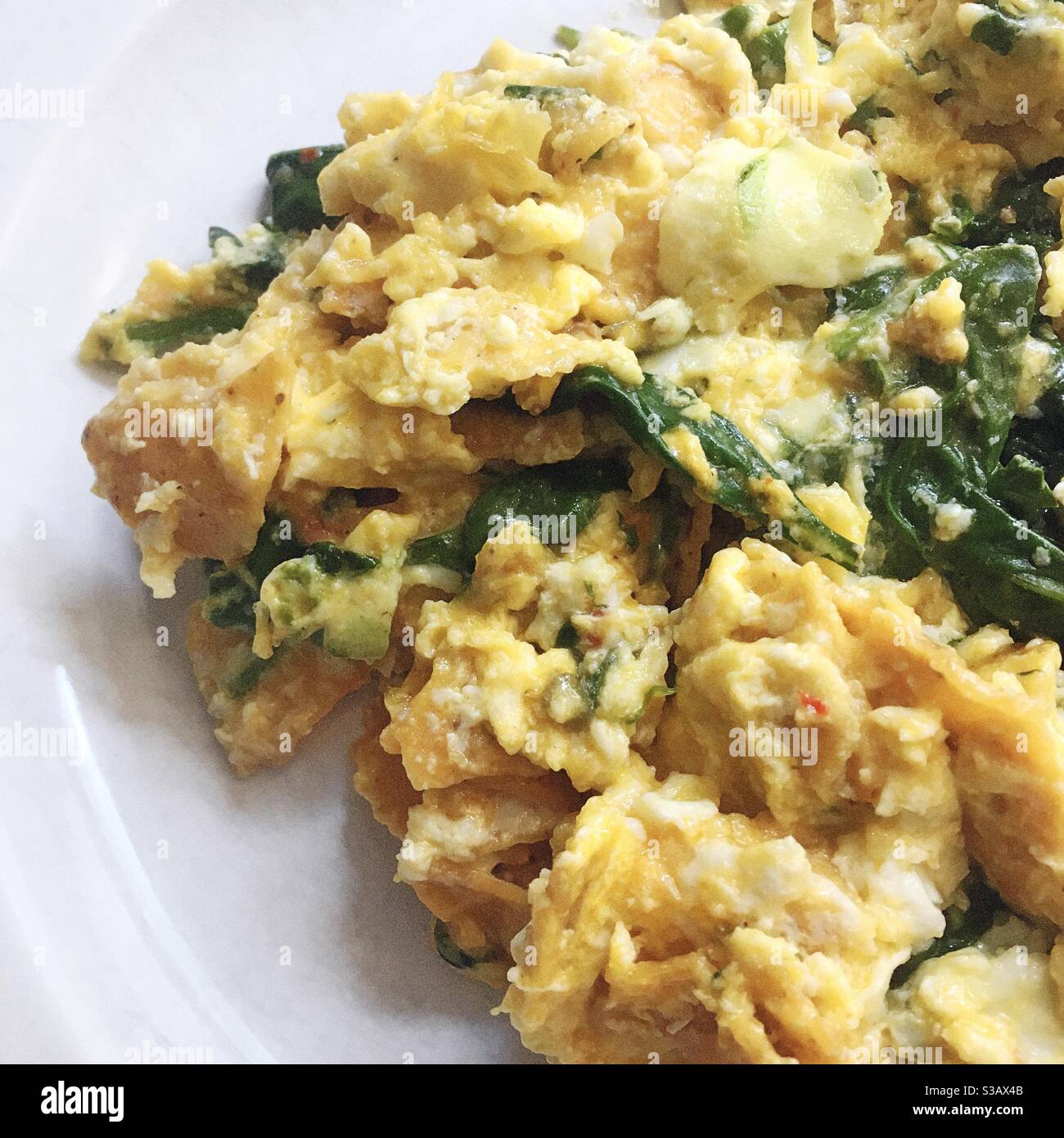 Scrambled eggs with habanero cheddar cheese, spinach and organic