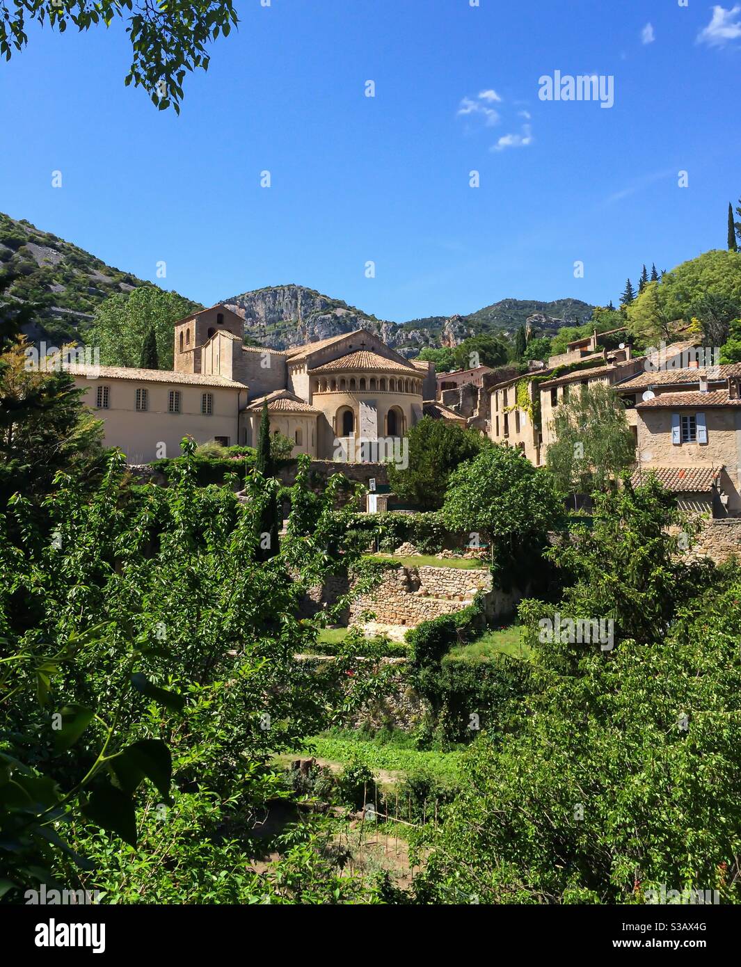 Saint Guilhem-le-desert France view on medieval village with abbey of gellone - Smartphone Captured Stock Image